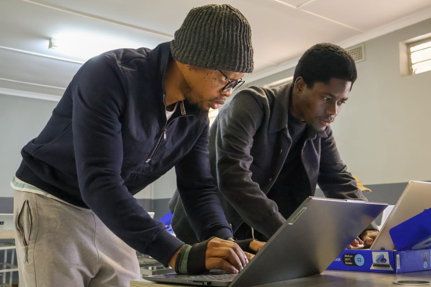 Fidel collaborating during a practical learning and technology session