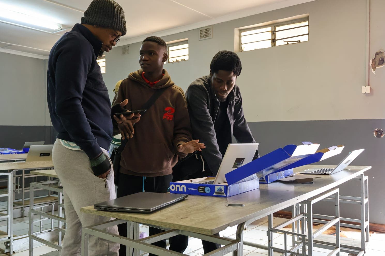 Fidel supporting a practical learning and technology session